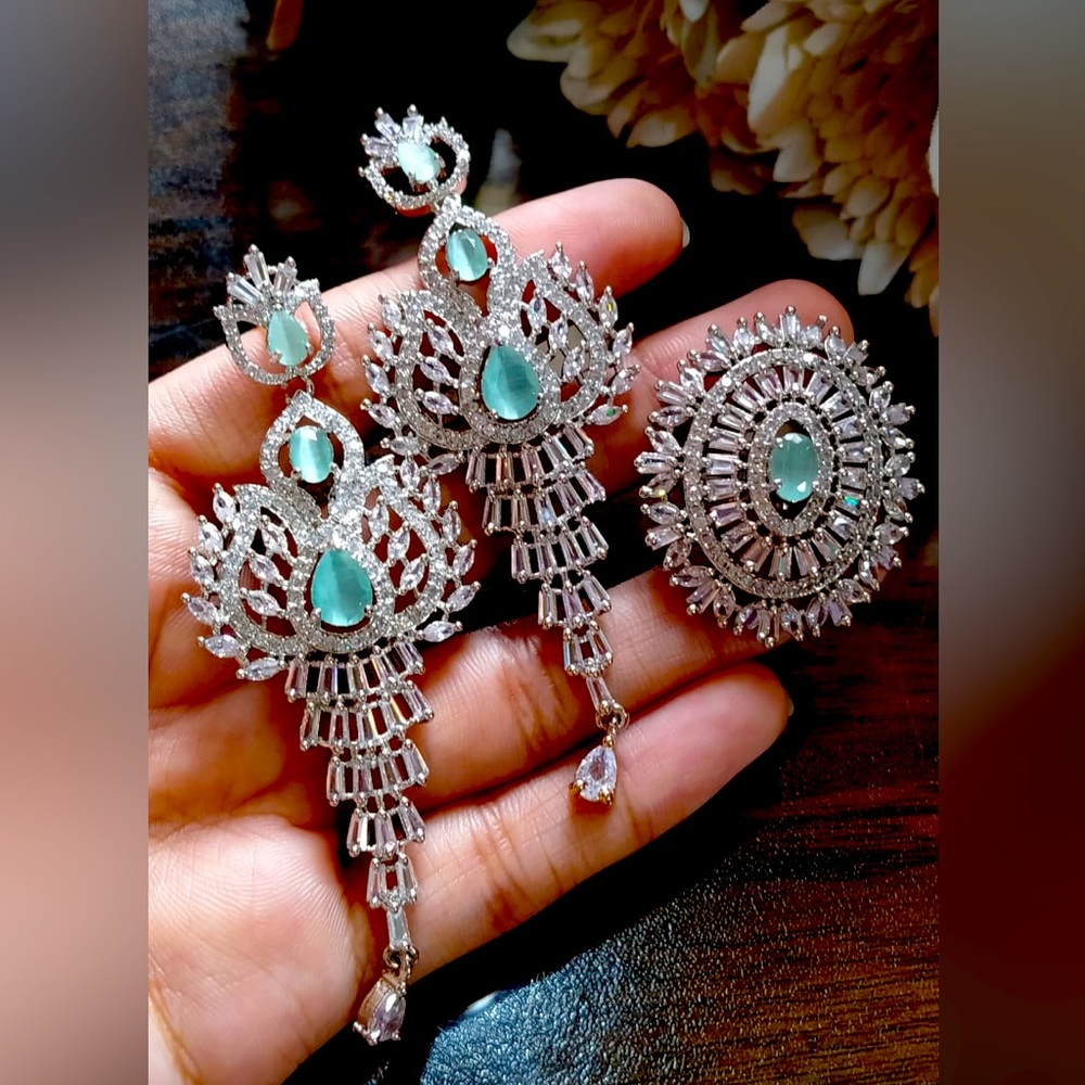 This AD stone earrings with adjustable ring
